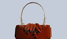 persimmon velvet leaf handbag